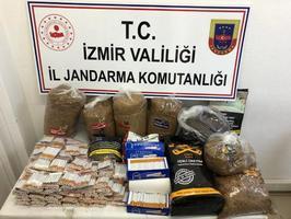 İzmir'in Aliağa ilçesinde yapılan operasyonda 4 bin 480 içi tütünle doldurulmuş makaron ve yaklaşık 34 kilogram bandrolsüz açık tütün ele geçirildi. ( İzmir İl Jandarma Komutanlığı - Anadolu Ajansı )