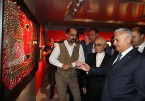 TBMM Başkanı Binali Yıldırım İzmir'de, Folkart Gallery'deki "Büyük Dahi/Gazi Mustafa Kemal" isimli serginin açılışına katıldı. ( TBMM / Mustafa Aktaş - Anadolu Ajansı )