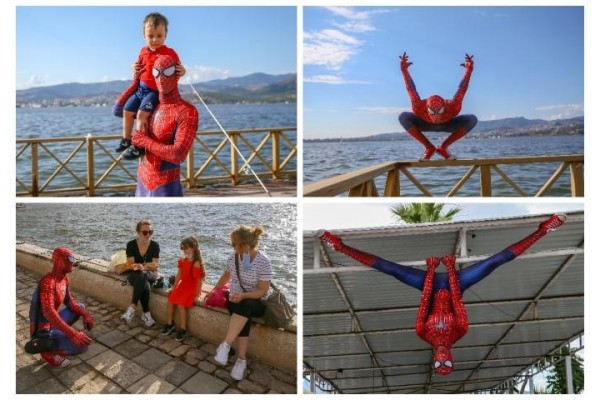 "ÖRÜMCEK ADAM" SOKAKLARDA GÖSTERİ YAPTI